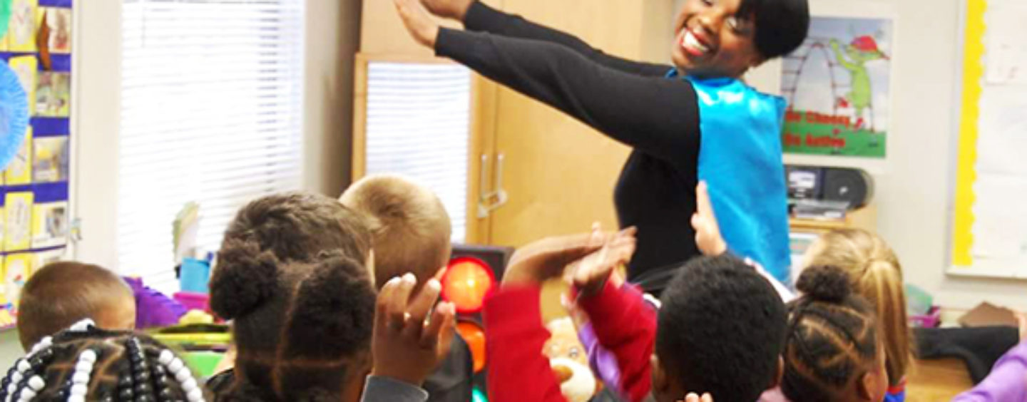 Woman Educator Who Transforms Herself into a Superhero in the Classroom